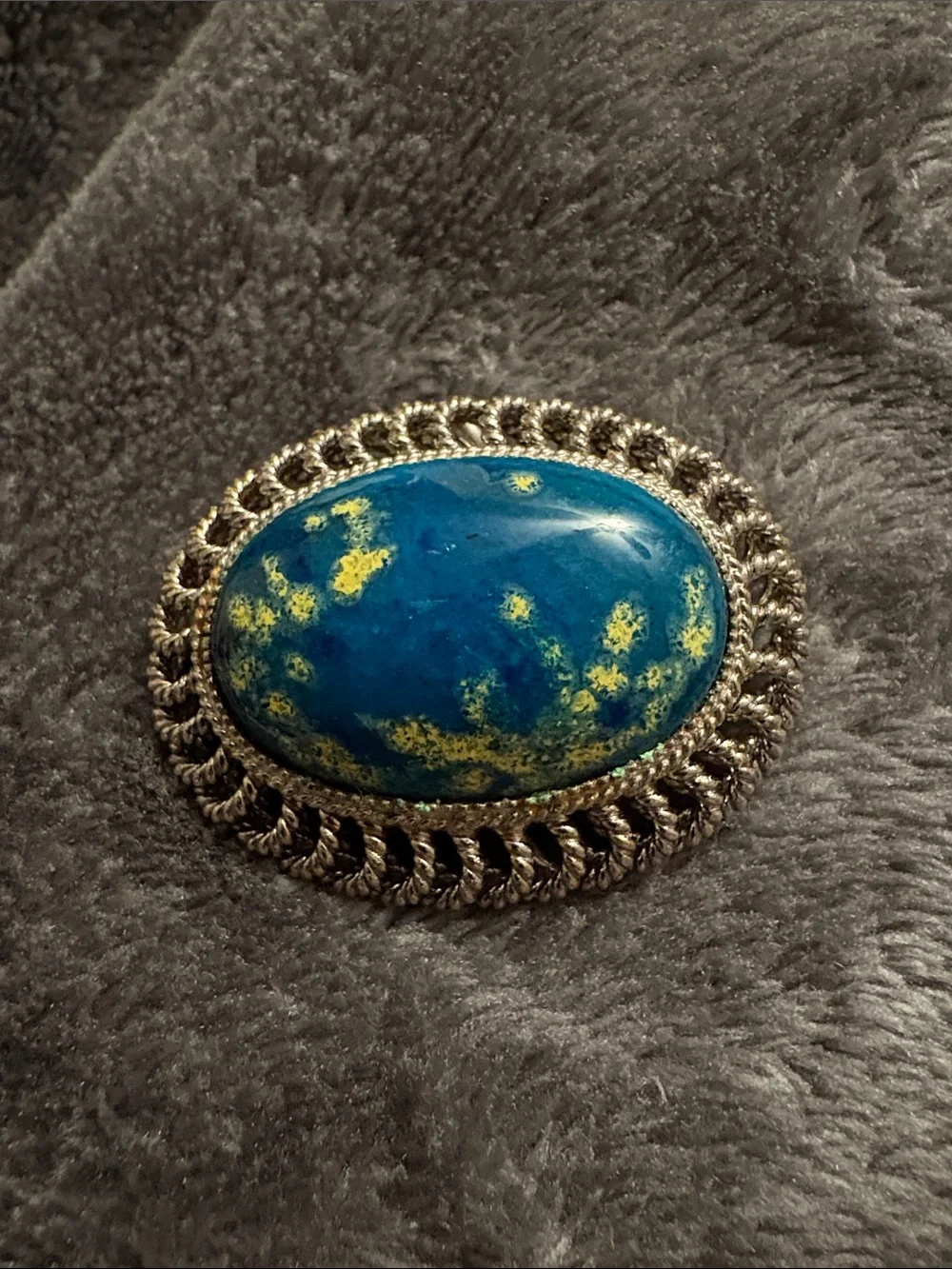 Blue and Yellow Speckled Lucite? Oval Brooch with Silver-Tone Rope Frame